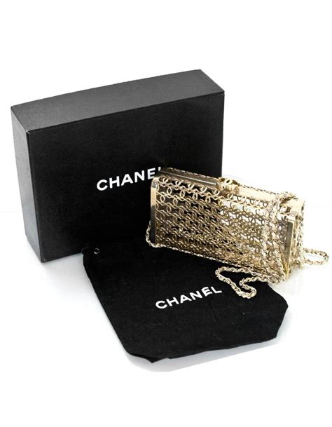 chanel paris dubai goldtone cc moucharabieh minaudiere gold metal clutch|Pre.